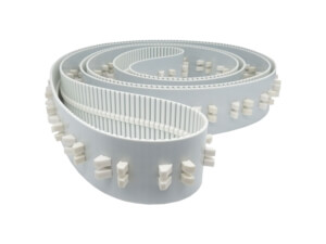 Timing belts with cleats